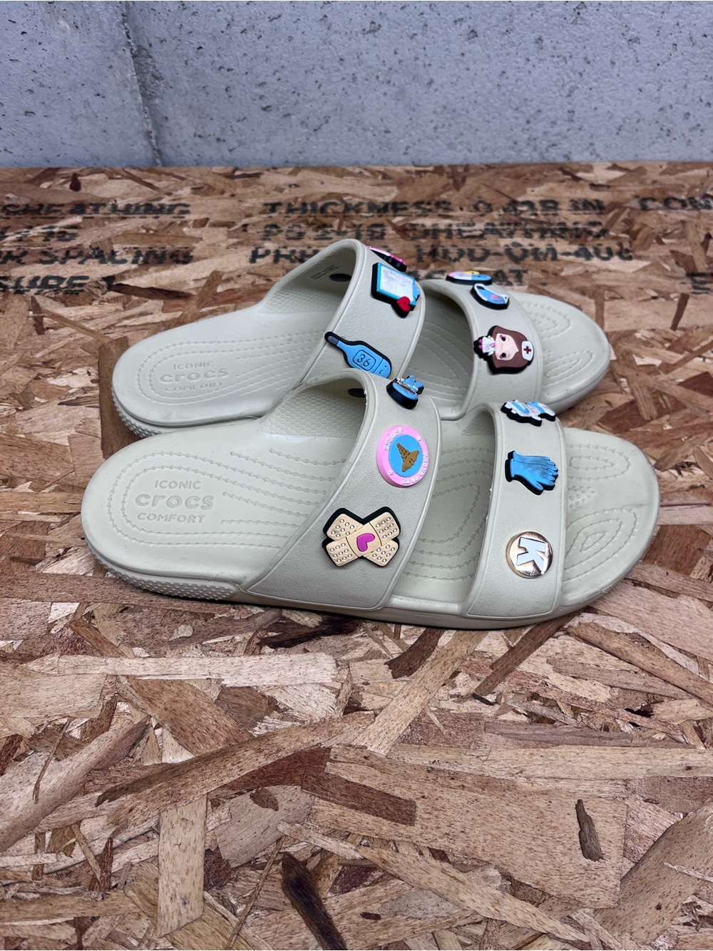 Crocs Classic Slide Sandals in Light Beige with Jibbitz Charms